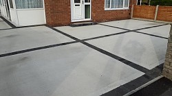 Concrete driveway with black edge